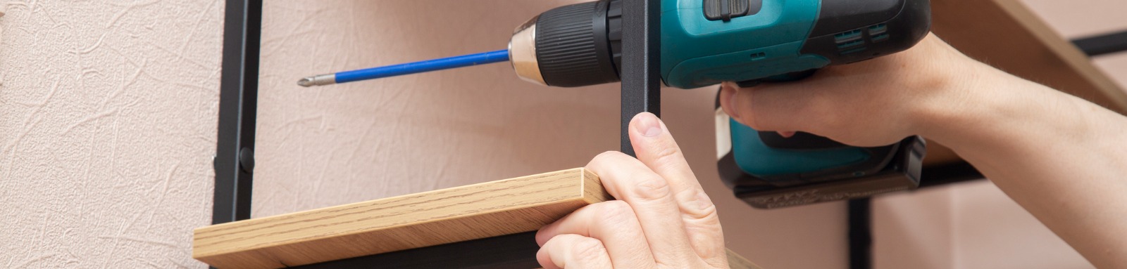 installing bookshelves on a drywall wall